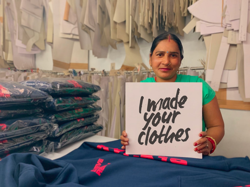 Women stitching garments in the ethical clothing factory of NG Apparels